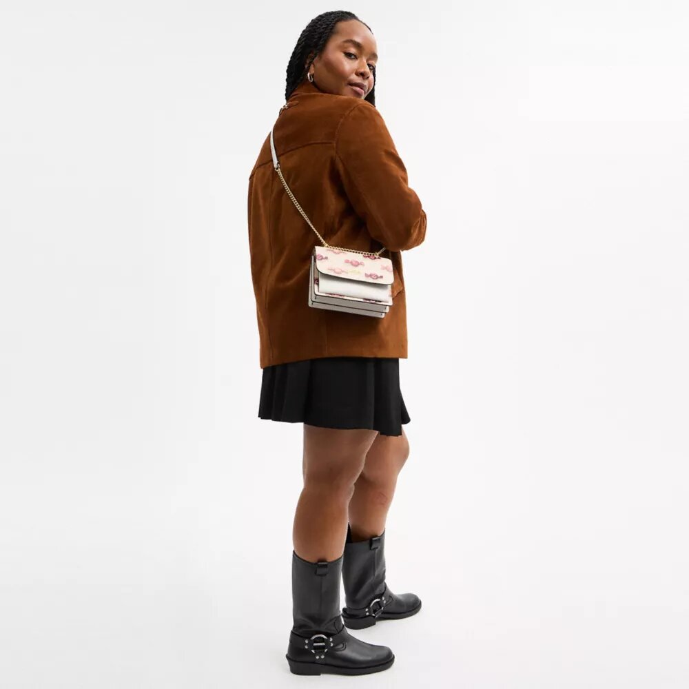 Bolsos bandolera Mini Klare con estampado de caramelos
