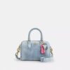 Bolsos bandolera Mini Rowan en denim desgastado con Charms