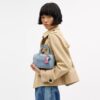 Bolsos bandolera Mini Rowan en denim desgastado con Charms
