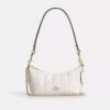 Bolsos de hombro Caitlin con acolchado y Charms