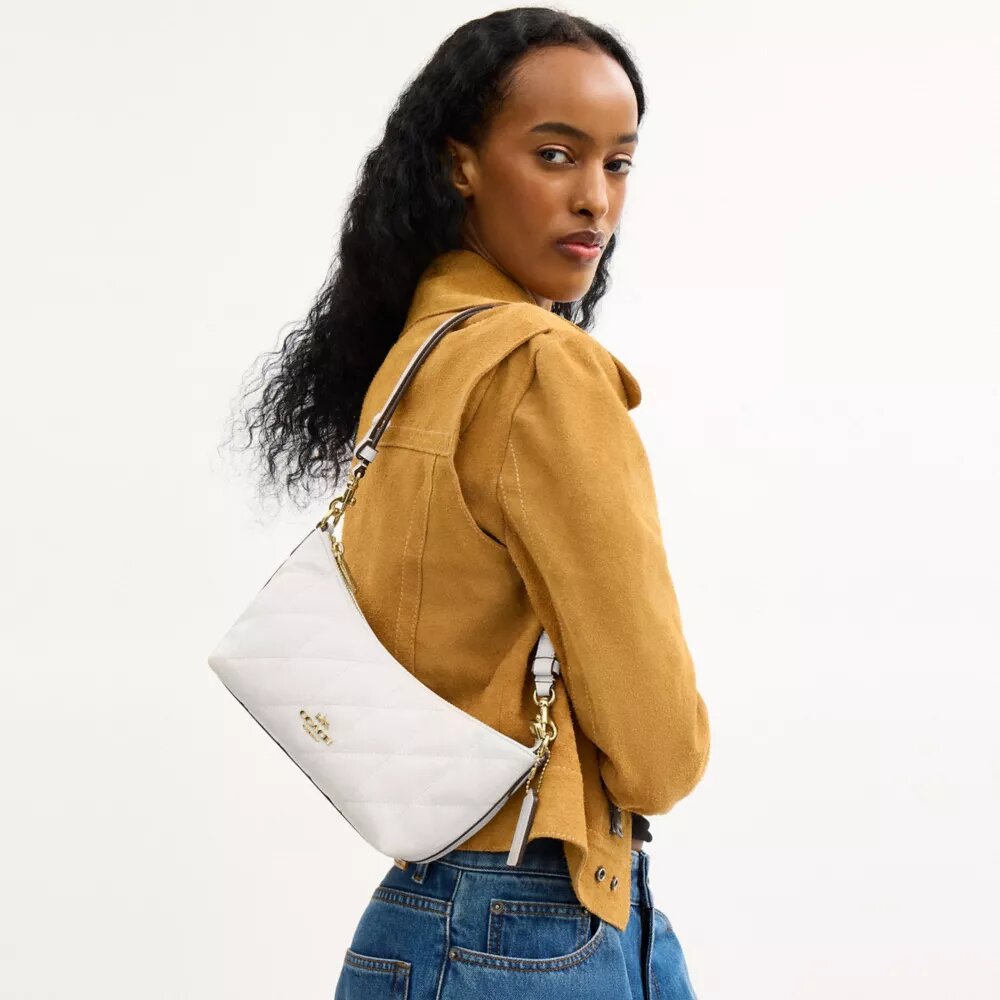 Bolsos de hombro Caitlin con acolchado y Charms