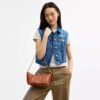Bolsos de hombro Caitlin con acolchado y Charms