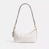 Bolsos de hombro Caitlin con acolchado y Charms