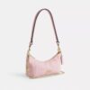 Bolsos de hombro Caitlin de algodón regenerativo con acolchado y Charms