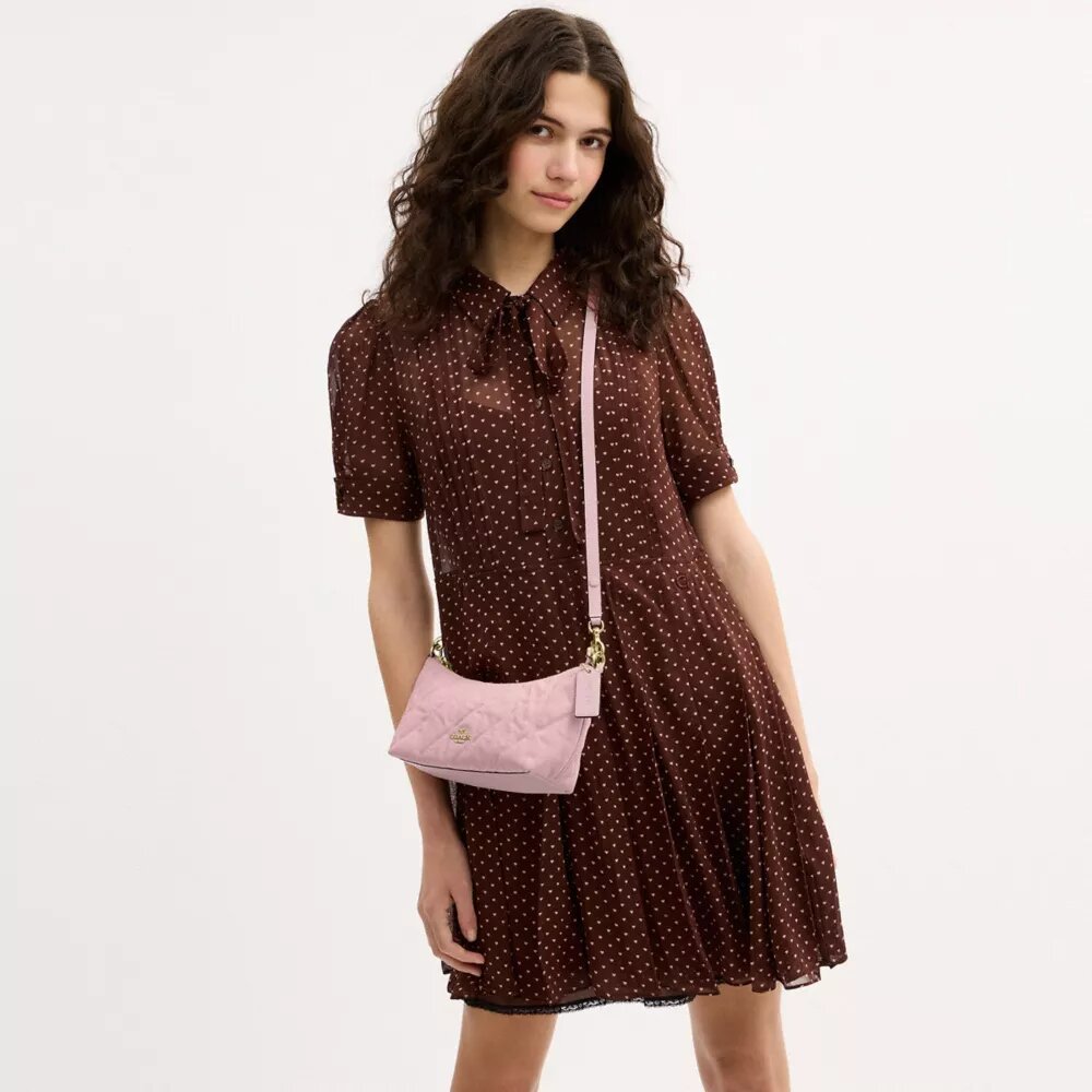 Bolsos de hombro Caitlin de algodón regenerativo con acolchado y Charms