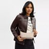 Bolsos de hombro Caitlin en Signature Canvas