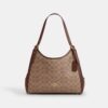 Bolsos de hombro Erin en Signature Canvas