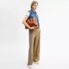 Bolsos de hombro Evelyn con acolchado y Charms