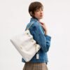 Bolsos de hombro Evelyn con acolchado y Charms