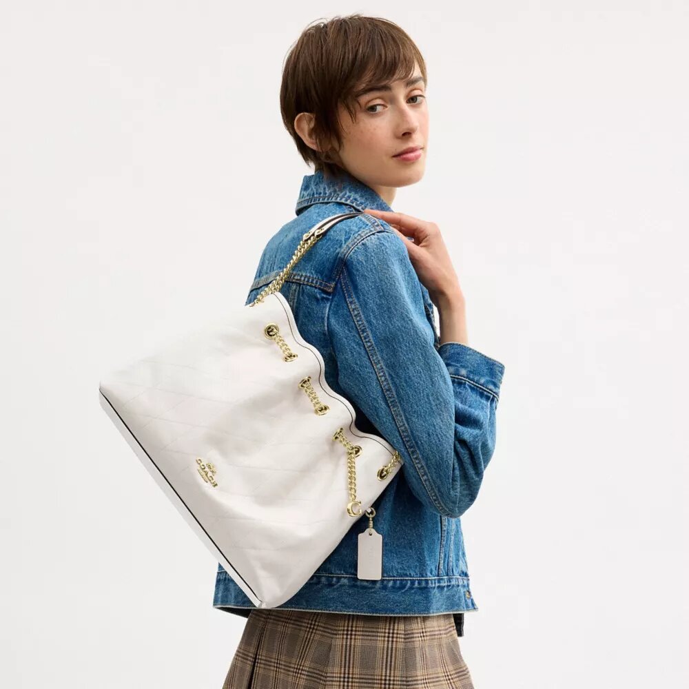 Bolsos de hombro Evelyn con acolchado y Charms