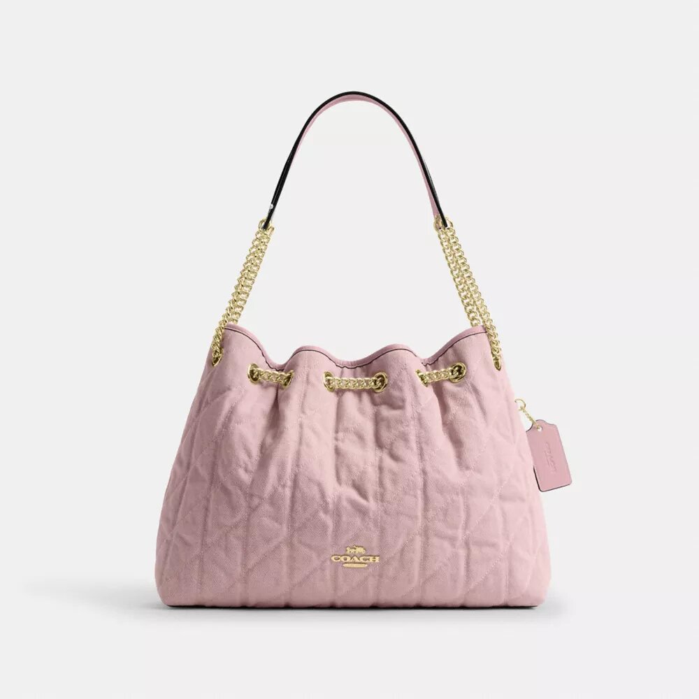 Bolsos de hombro Evelyn en denim desgastado con acolchado y Charms