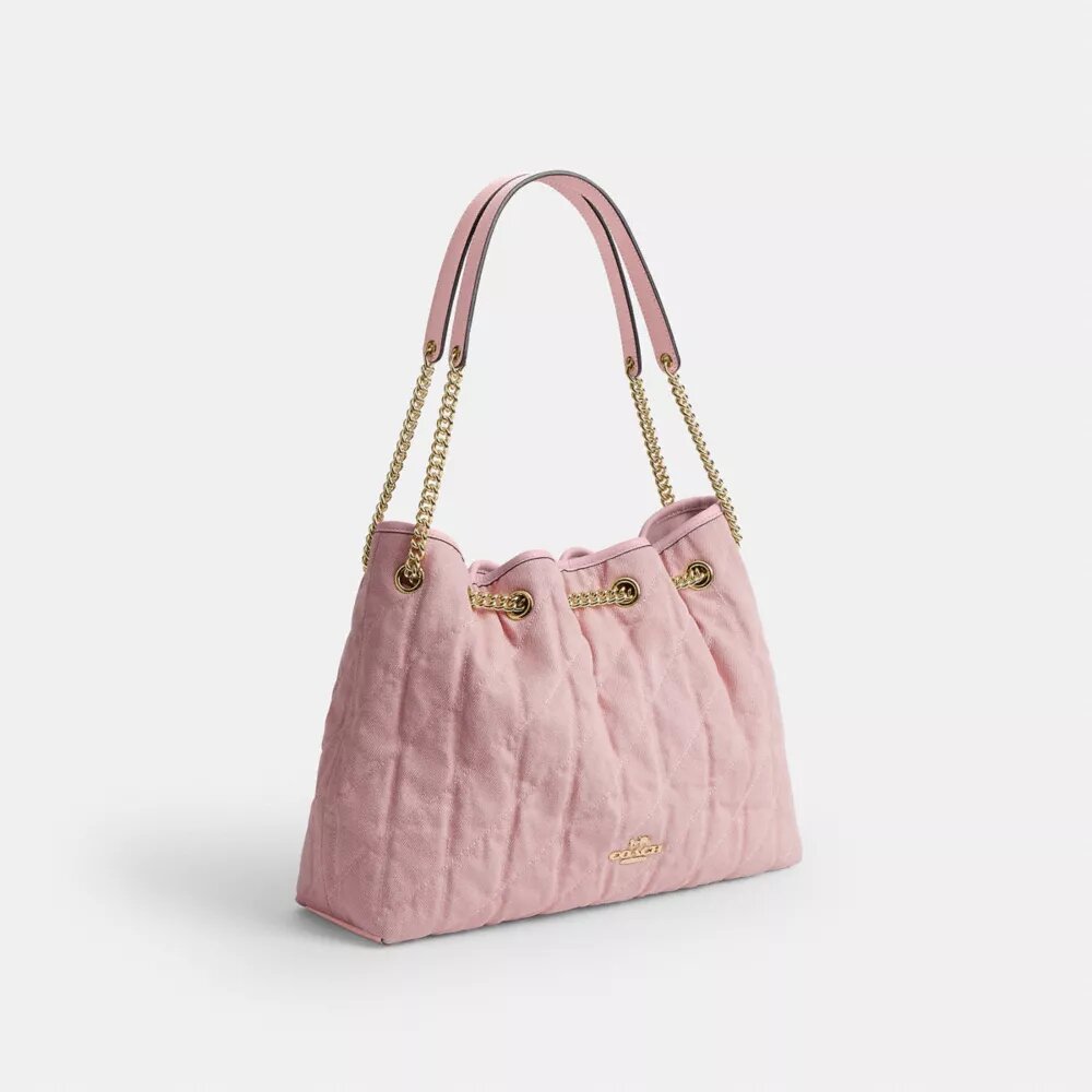 Bolsos de hombro Evelyn en denim desgastado con acolchado y Charms
