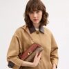Bolsos de hombro Jet en Signature Canvas