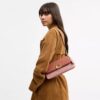 Bolsos de hombro Jet en Signature Canvas