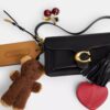 Bolsos de hombro Tabby 26 con Charms