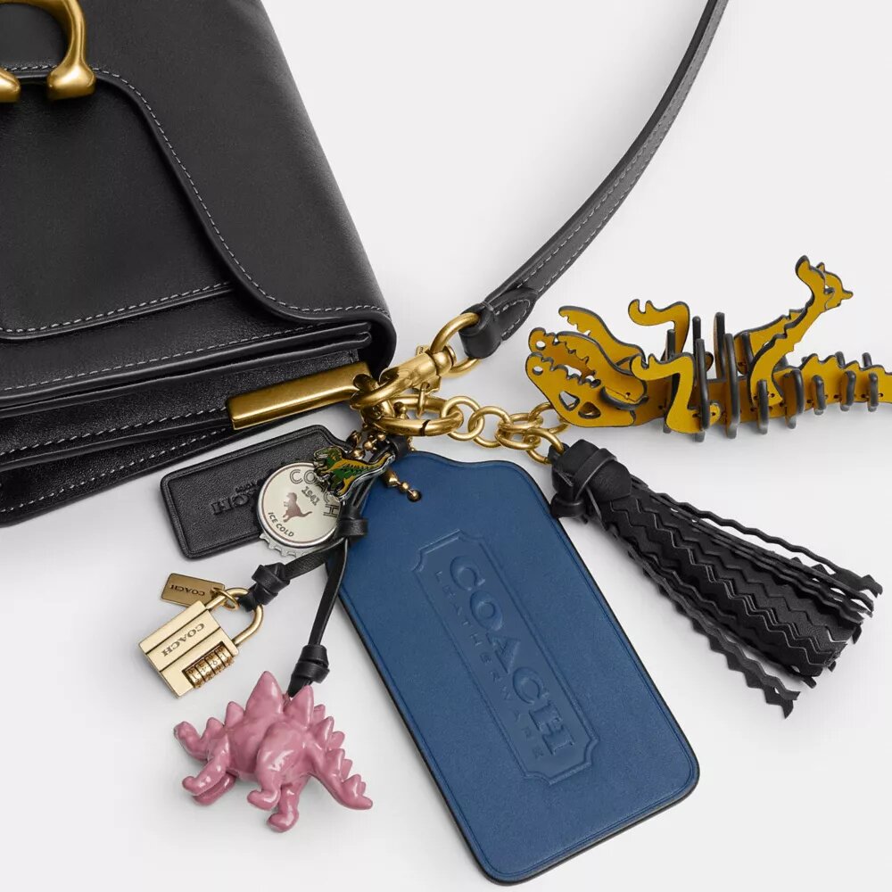Bolsos de hombro «Tabby» 26 de Rexy con colgantes para bolsos, con motivo del 10.º cumpleaños