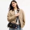 Bolsos de hombro «Tabby» 26 de Rexy con colgantes para bolsos, con motivo del 10.º cumpleaños