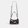 Bolsos de hombro Teri con lazos y Charms