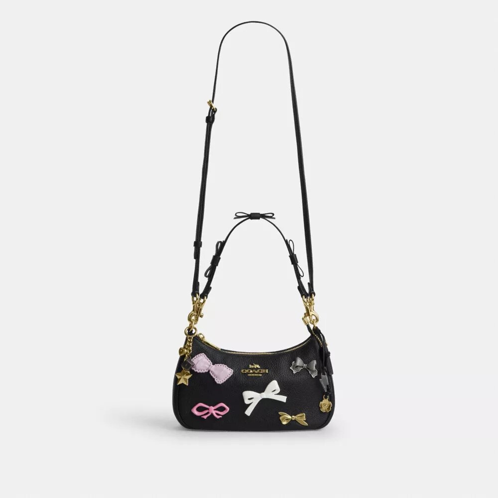 Bolsos de hombro Teri con lazos y Charms
