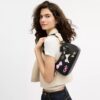 Bolsos de hombro Teri con lazos y Charms