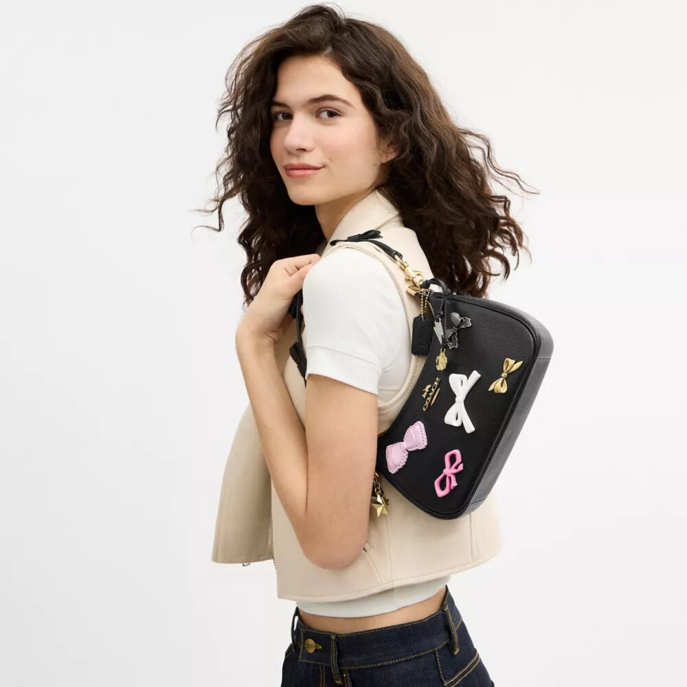 Bolsos de hombro Teri con lazos y Charms