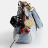 Bolsos de hombro Teri en denim desgastado con Charms