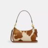 Bolsos de hombro Teri en piel de becerro con estampado de vaca