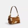 Bolsos de hombro Teri en piel de becerro con estampado de vaca