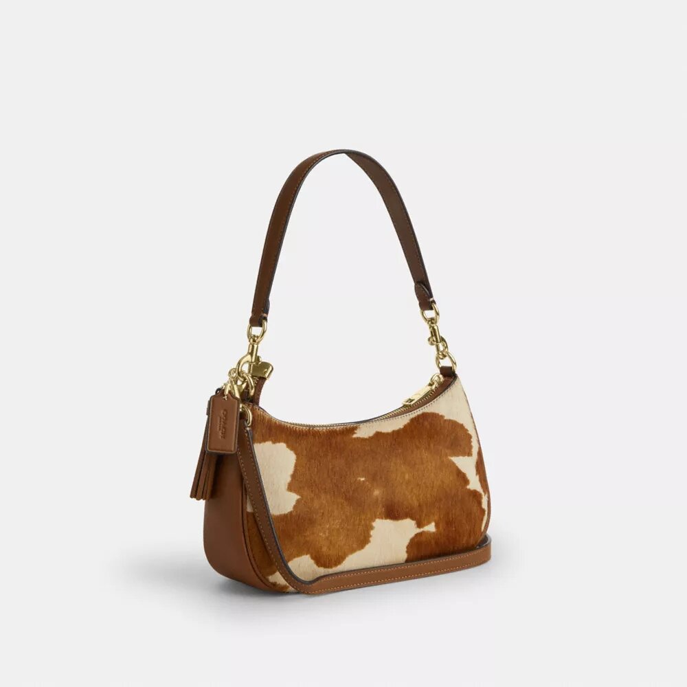 Bolsos de hombro Teri en piel de becerro con estampado de vaca
