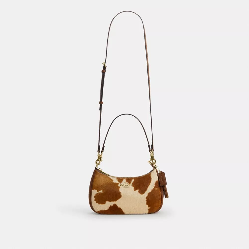 Bolsos de hombro Teri en piel de becerro con estampado de vaca