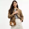 Bolsos de hombro Teri en piel de becerro con estampado de vaca