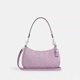 Bolsos de hombro Teri en piel exclusiva con colgante de corazón