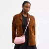 Bolsos de hombro Teri en piel exclusiva con colgante de corazón