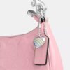 Bolsos de hombro Teri en piel exclusiva con colgante de corazón