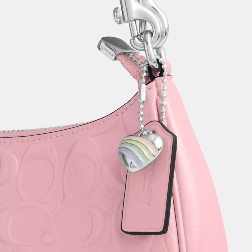 Bolsos de hombro Teri en piel exclusiva con colgante de corazón