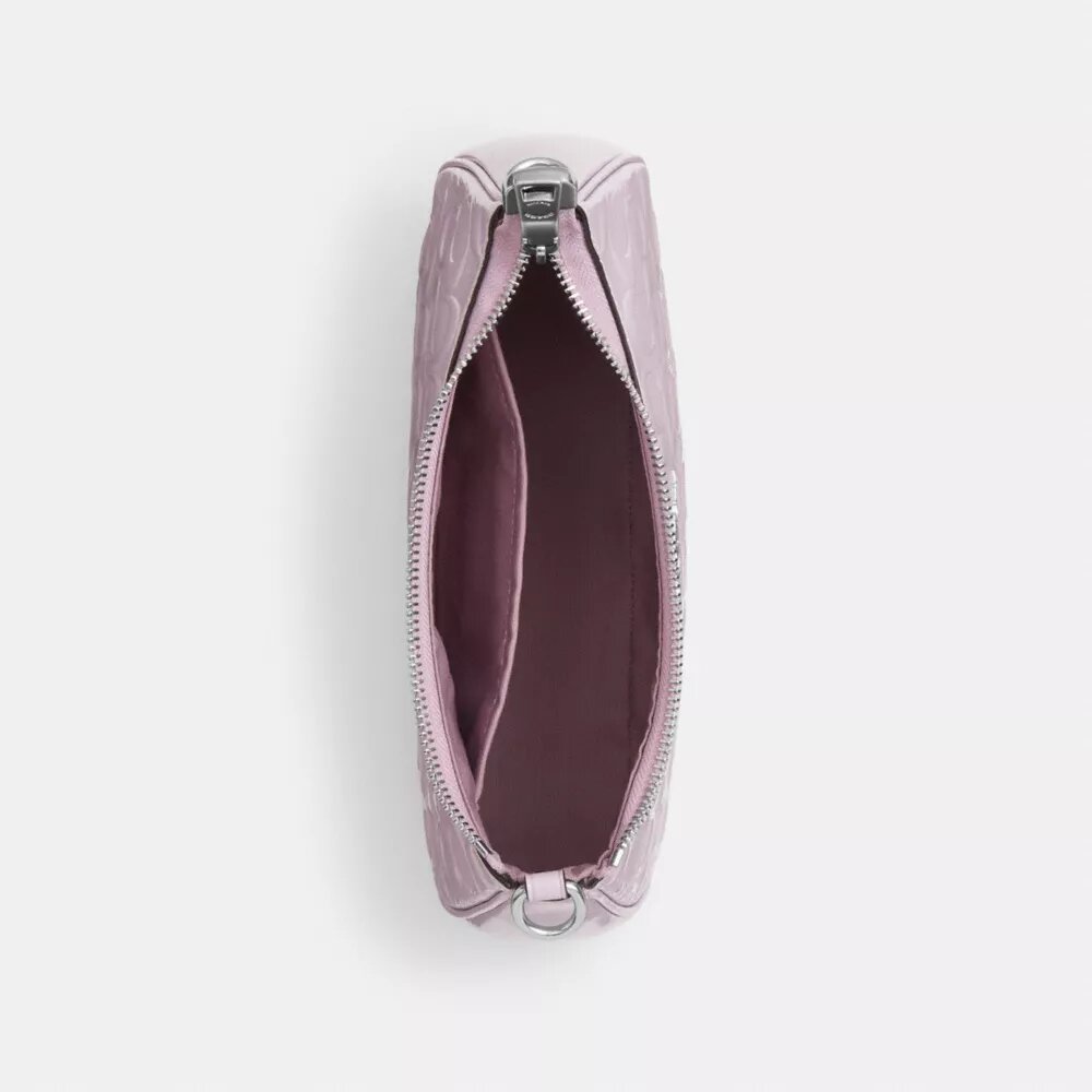 Bolsos de hombro Teri en piel exclusiva con colgante de corazón