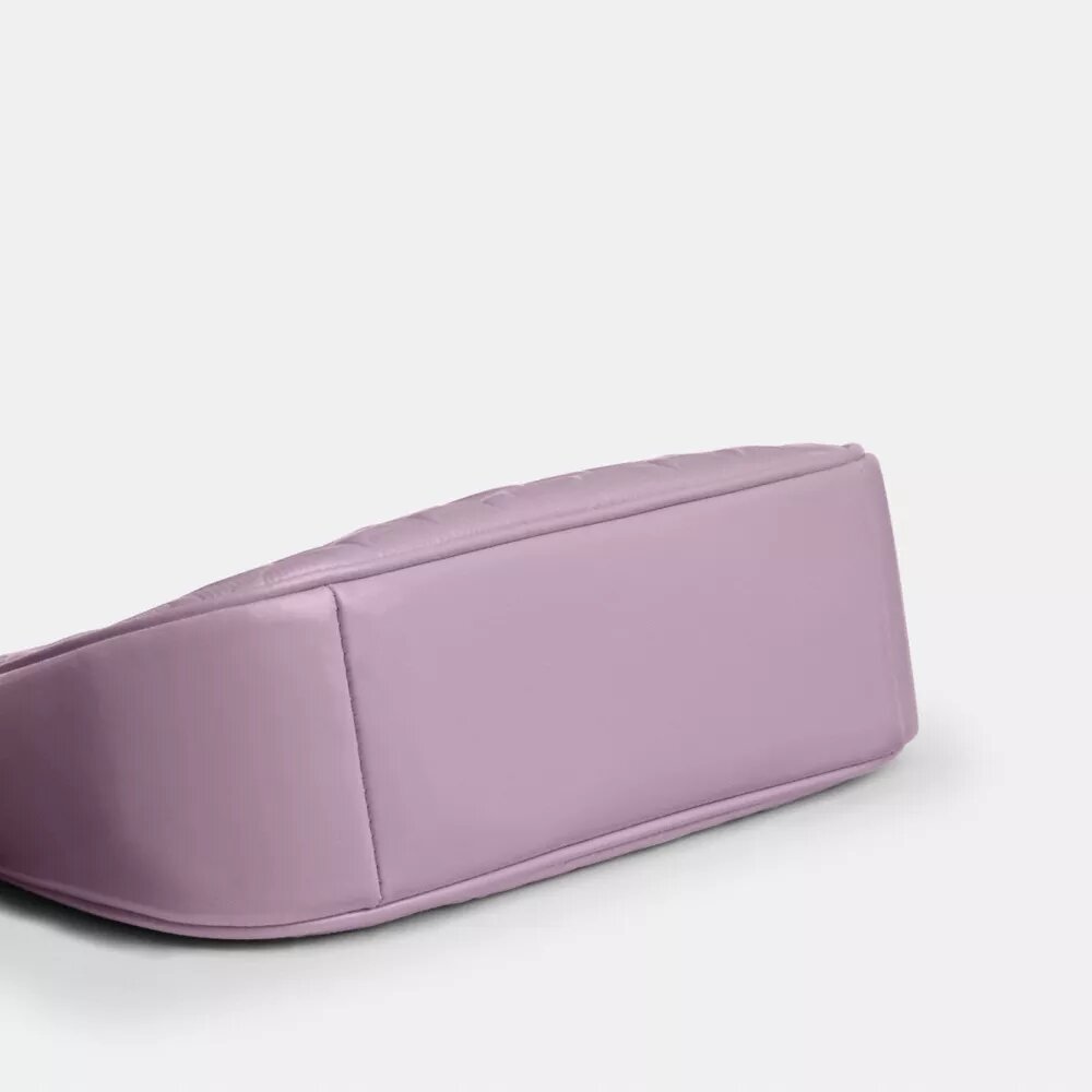 Bolsos de hombro Teri en piel exclusiva con colgante de corazón