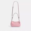 Bolsos de hombro Teri en piel exclusiva con colgante de corazón