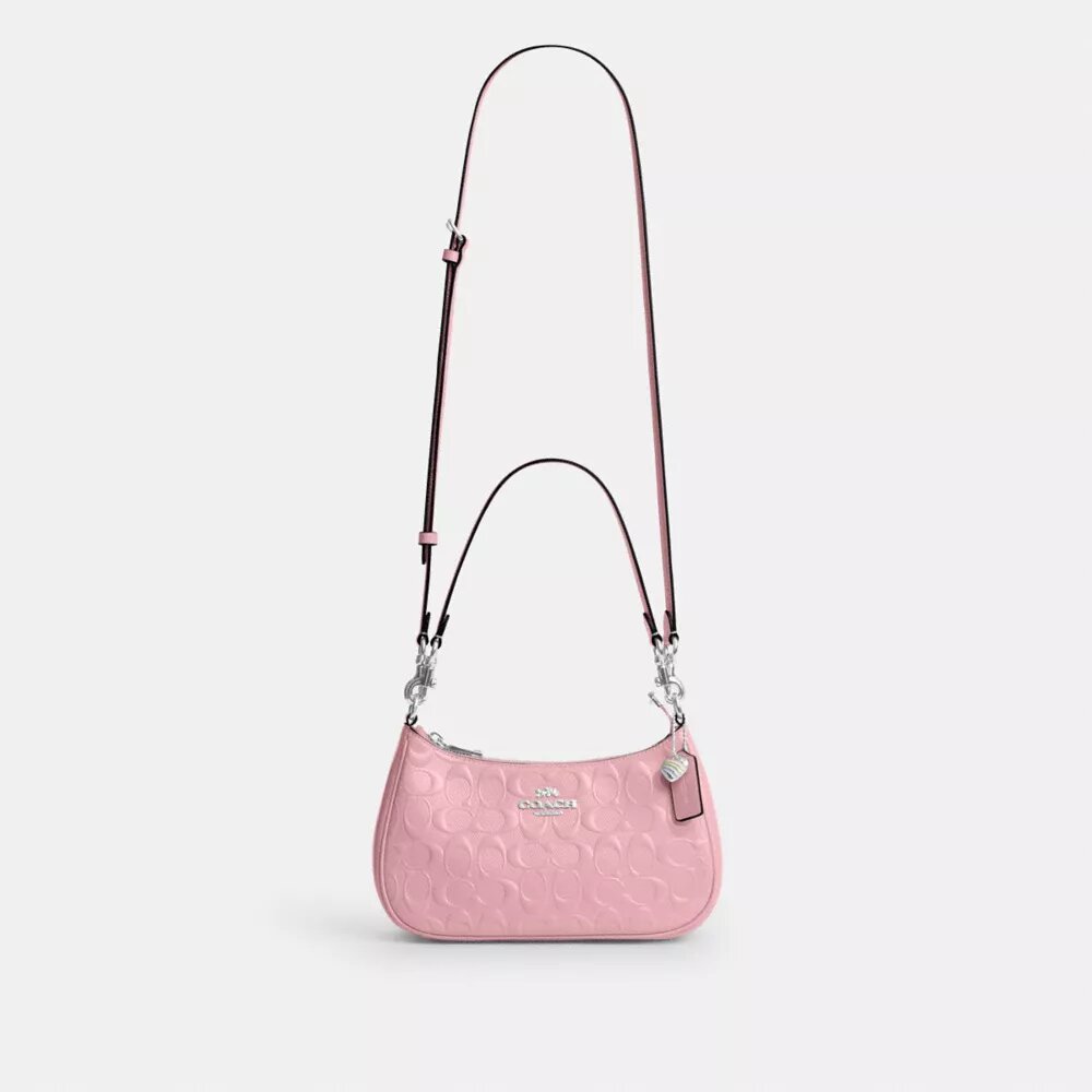 Bolsos de hombro Teri en piel exclusiva con colgante de corazón