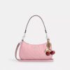 Bolsos de hombro Teri en piel exclusiva con colgante de corazón