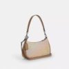 Bolsos de hombro Teri en Signature Canvas