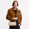 Bolsos de hombro Teri en Signature Canvas