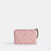 Bolsos de pulsera con cremallera en la esquina y estampado floral