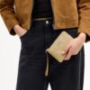 Bolsos de pulsera con cremallera en la esquina y estampado floral