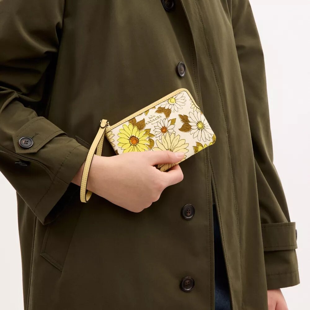 Bolsos de pulsera con cremallera en la esquina y estampado floral