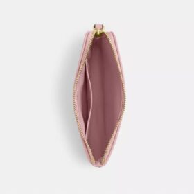 Bolsos de pulsera con cremallera en las esquinas en denim emblemático