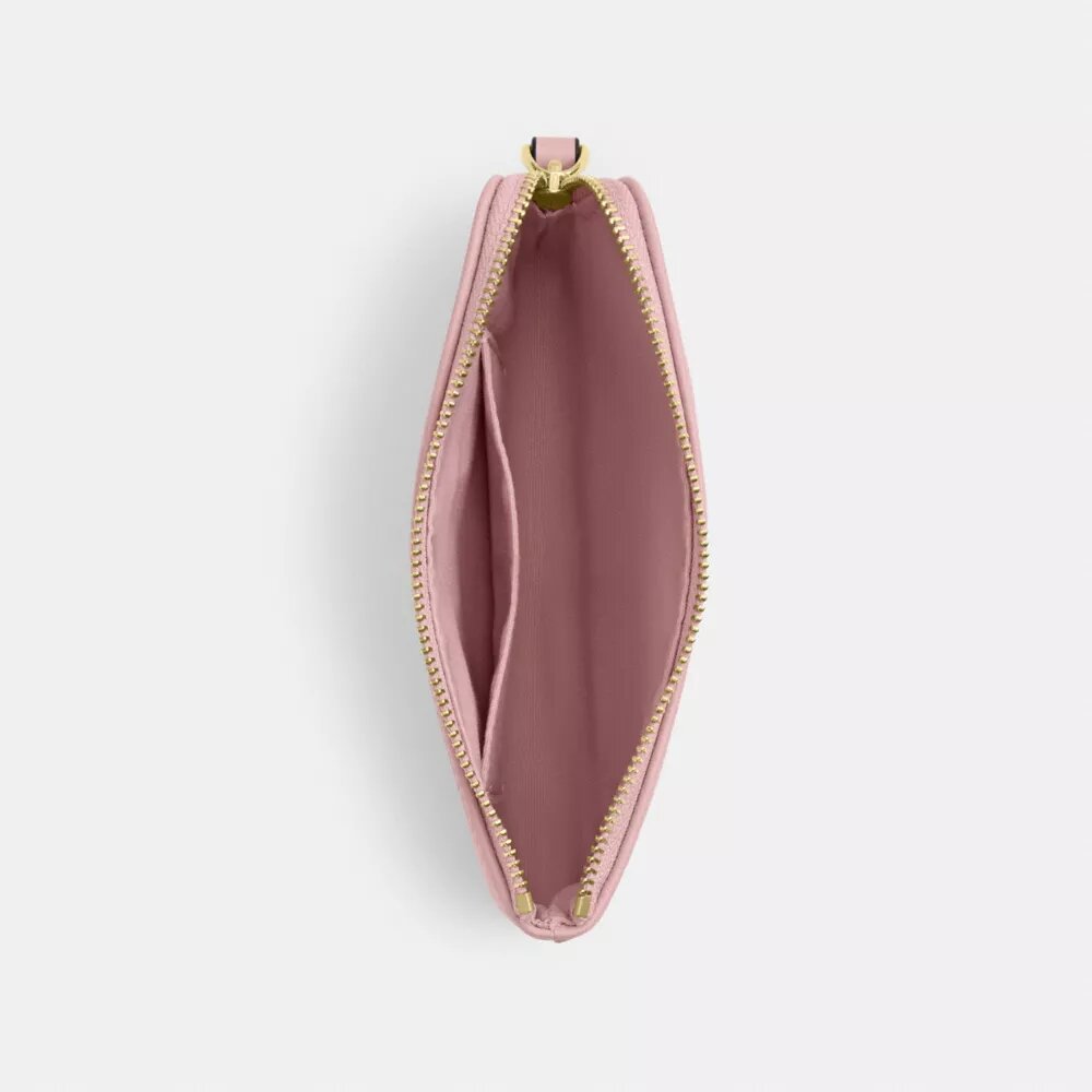 Bolsos de pulsera con cremallera en las esquinas en denim emblemático
