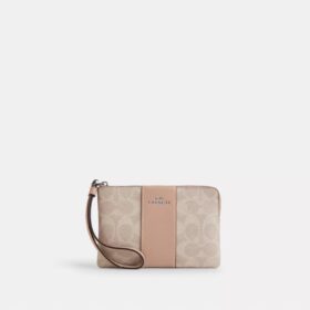 Bolsos de pulsera con cremallera en las esquinas, en Signature Canvas con rayas