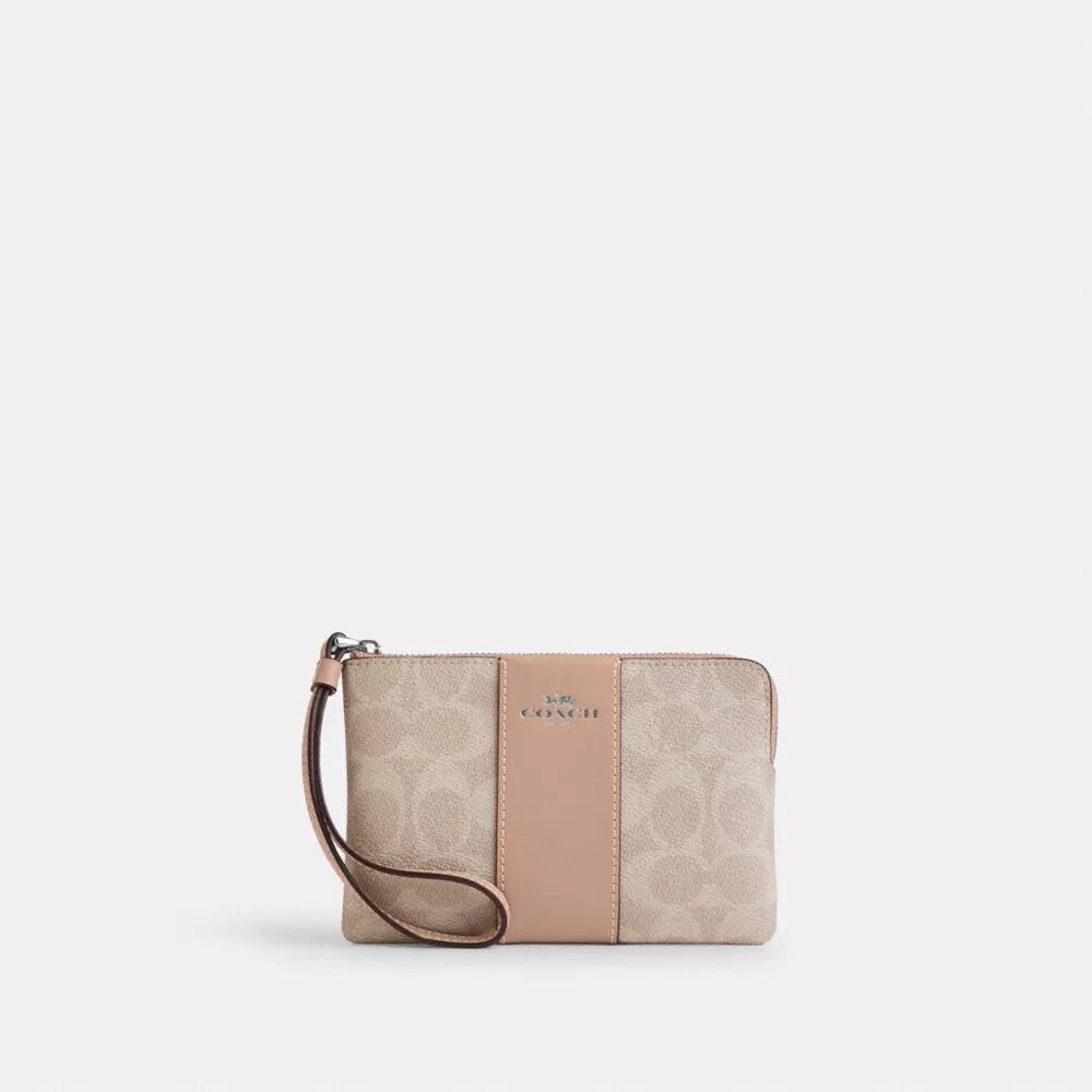 Bolsos de pulsera con cremallera en las esquinas, en Signature Canvas con rayas