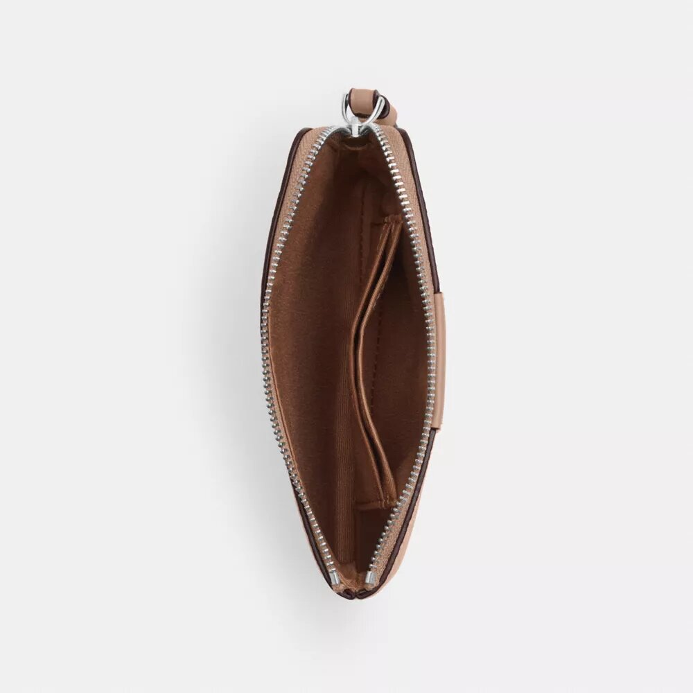 Bolsos de pulsera con cremallera en las esquinas, en Signature Canvas con rayas